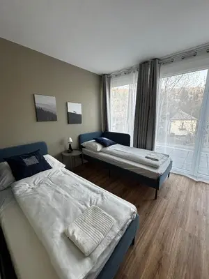 Ein Bett oder Betten in einem Zimmer der Unterkunft Nest Natur Hostel
