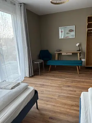 Ein Bett oder Betten in einem Zimmer der Unterkunft Nest Natur Hostel