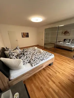 Ein Bett oder Betten in einem Zimmer der Unterkunft Monterey Apartment Vienna