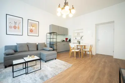Küche/Küchenzeile in der Unterkunft Spacious apartment with huge shared terrace and grill located between city centre and Donau river