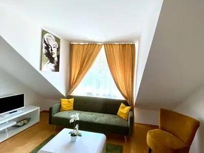 Ein Sitzbereich in der Unterkunft Cosy apartment in central location