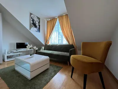 Ein Sitzbereich in der Unterkunft Cosy apartment in central location