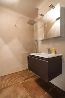 Ein Badezimmer in der Unterkunft Cosy apartment near VIC (UNO City)