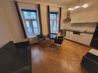 Küche/Küchenzeile in der Unterkunft CozyNite Premium Apartment Hundertwasser