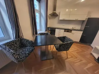 Küche/Küchenzeile in der Unterkunft CozyNite Premium Apartment Hundertwasser