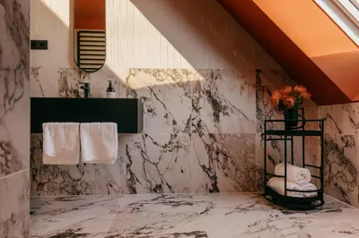 Ein Badezimmer in der Unterkunft WELTWIEN Luxury Art Apartments & Free Parking