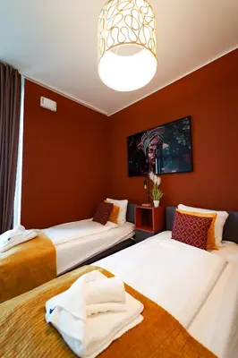 Ein Bett oder Betten in einem Zimmer der Unterkunft Wonderful Apartment with 2 bedrooms and pool and parking