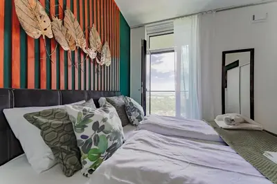 Ein Bett oder Betten in einem Zimmer der Unterkunft Wonderful Apartment with 2 bedrooms and pool and parking