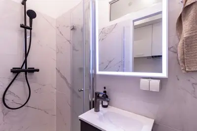 Ein Badezimmer in der Unterkunft Central Apartment