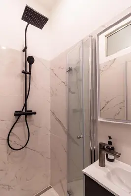 Ein Badezimmer in der Unterkunft Central Apartment