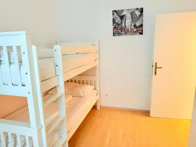 Ein Bett oder Betten in einem Zimmer der Unterkunft Gesamte Unterkunft für 4 Personen Top 12