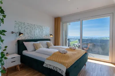 Ein Bett oder Betten in einem Zimmer der Unterkunft Grüne Oase an der Therme