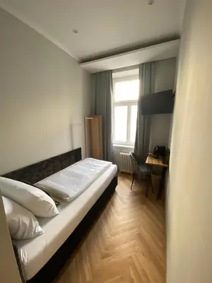 Ein Bett oder Betten in einem Zimmer der Unterkunft Boutique Hotel Kolbeck