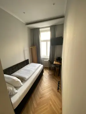 Ein Bett oder Betten in einem Zimmer der Unterkunft Boutique Hotel Kolbeck