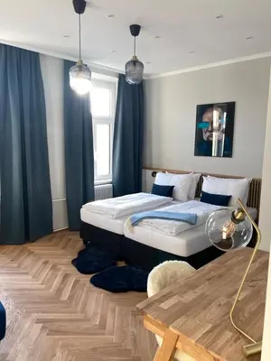 Ein Bett oder Betten in einem Zimmer der Unterkunft Boutique Hotel Kolbeck