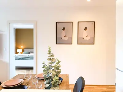 Ein Bett oder Betten in einem Zimmer der Unterkunft Ruheoase mit Parkblick - 15 Min Zentrum - Therme & Gym