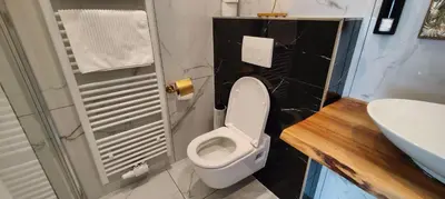 Ein Badezimmer in der Unterkunft XuBa ApartmentRooms Messe Wien Prater
