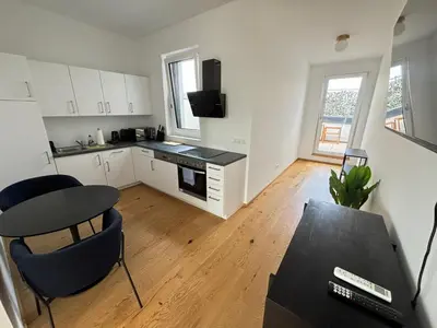 Küche/Küchenzeile in der Unterkunft OrestaLiving - Penthouse in 2nd District with View