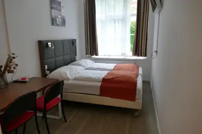 Ein Bett oder Betten in einem Zimmer der Unterkunft Comfy Mini Apartments Vienna