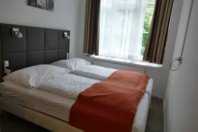 Ein Bett oder Betten in einem Zimmer der Unterkunft Comfy Mini Apartments Vienna