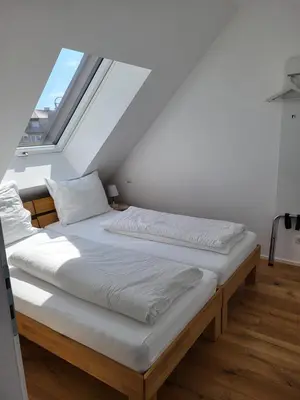 Ein Bett oder Betten in einem Zimmer der Unterkunft SkySuite Holiday Home