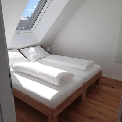 Ein Bett oder Betten in einem Zimmer der Unterkunft SkySuite Holiday Home