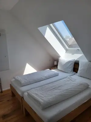 Ein Bett oder Betten in einem Zimmer der Unterkunft SkySuite Holiday Home