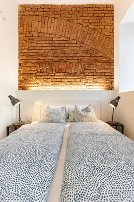 Ein Bett oder Betten in einem Zimmer der Unterkunft Stilvolles Apartment in toller Lage, 