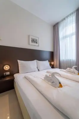 Ein Bett oder Betten in einem Zimmer der Unterkunft josef's home I Apartment Klährgasse I 02
