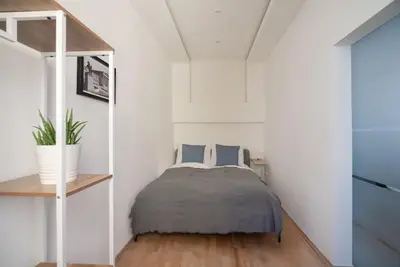 Ein Bett oder Betten in einem Zimmer der Unterkunft Große Terrasse, Klimaanlage und U-Bahn Nähe