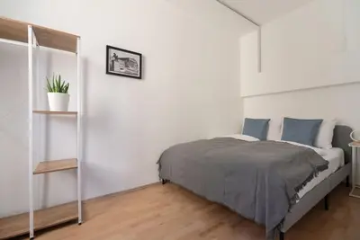 Ein Bett oder Betten in einem Zimmer der Unterkunft Große Terrasse, Klimaanlage und U-Bahn Nähe