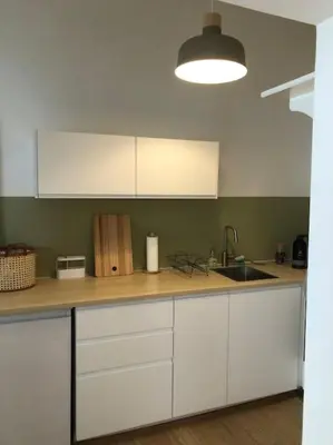 Küche/Küchenzeile in der Unterkunft Neues, gemütliches Studio im Zentrum in Ruhelage