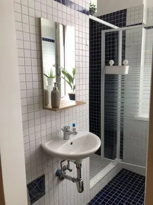 Ein Badezimmer in der Unterkunft Neues, gemütliches Studio im Zentrum in Ruhelage