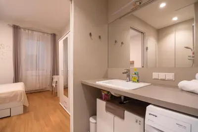 Ein Bett oder Betten in einem Zimmer der Unterkunft An der Donau, 10 Minuten ins Zentrum, Klimaanlage