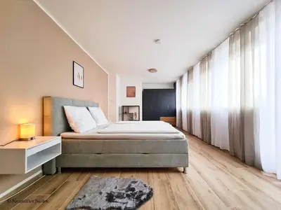 Ein Bett oder Betten in einem Zimmer der Unterkunft St. Antoni Suite 5