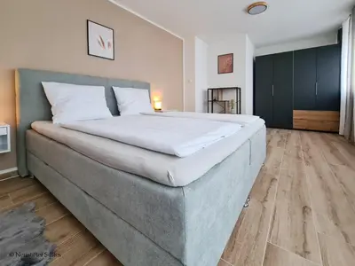 Ein Bett oder Betten in einem Zimmer der Unterkunft St. Antoni Suite 5
