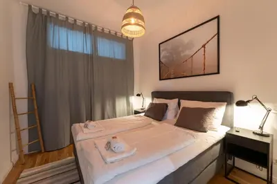 Ein Bett oder Betten in einem Zimmer der Unterkunft josef's home I Comfort Apartment I Metro Access
