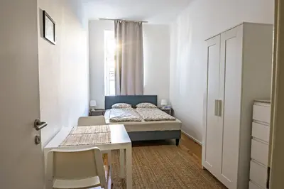 Ein Bett oder Betten in einem Zimmer der Unterkunft Vienna City Apartments Angeligasse