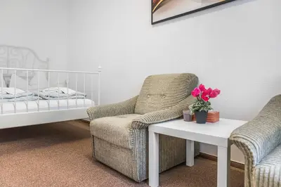 Ein Bett oder Betten in einem Zimmer der Unterkunft Adorable 2BR Apt. near Millenium Tower and Danube