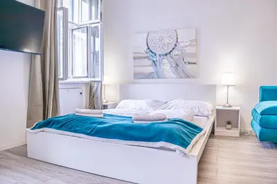 Ein Bett oder Betten in einem Zimmer der Unterkunft Cozy Studio Apt Near Vienna Wiener Stadthalle