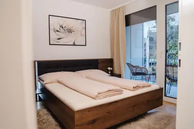Ein Bett oder Betten in einem Zimmer der Unterkunft 10 minutes to the center, 2 minutes to the metro