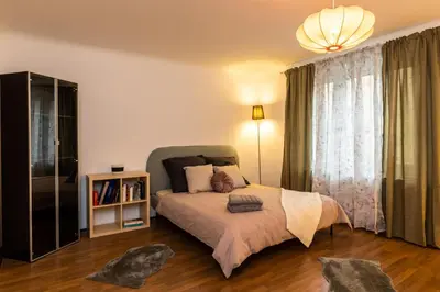 Ein Bett oder Betten in einem Zimmer der Unterkunft Cosy apartment in great Location