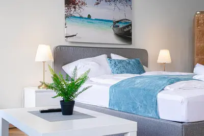 Ein Bett oder Betten in einem Zimmer der Unterkunft 4 Great Apartment Near AKH - Ideal for Groups of 19