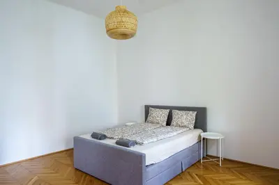 Ein Bett oder Betten in einem Zimmer der Unterkunft Vienna City Apartments 1090 Vienna