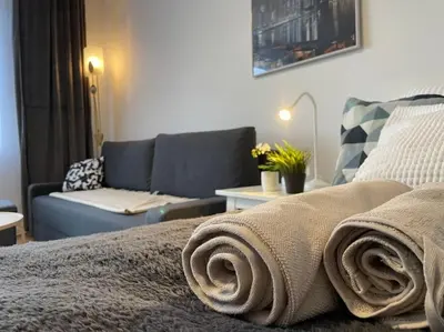 Ein Bett oder Betten in einem Zimmer der Unterkunft Charming Apartment near City Center