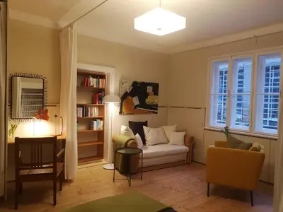 Ein Sitzbereich in der Unterkunft Das Kleine Haus - Vintage-Apartment im Innenhof