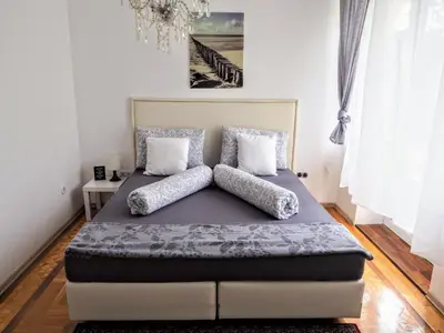 Ein Bett oder Betten in einem Zimmer der Unterkunft City Villa Schönbrunn Apartments - Contactless 24h Check-In