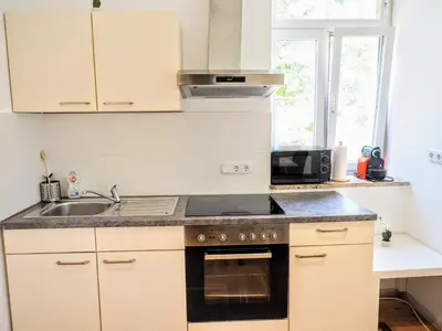 Küche/Küchenzeile in der Unterkunft City Villa Schönbrunn Apartments - Contactless 24h Check-In