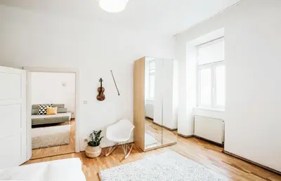 Ein Bett oder Betten in einem Zimmer der Unterkunft Cozy City Apartment