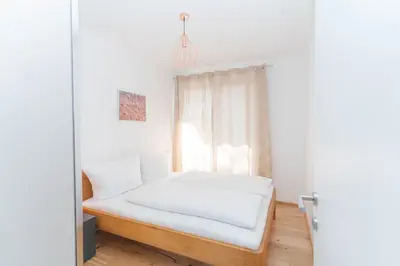 Ein Bett oder Betten in einem Zimmer der Unterkunft Luxurious apartment with big balcony near city center